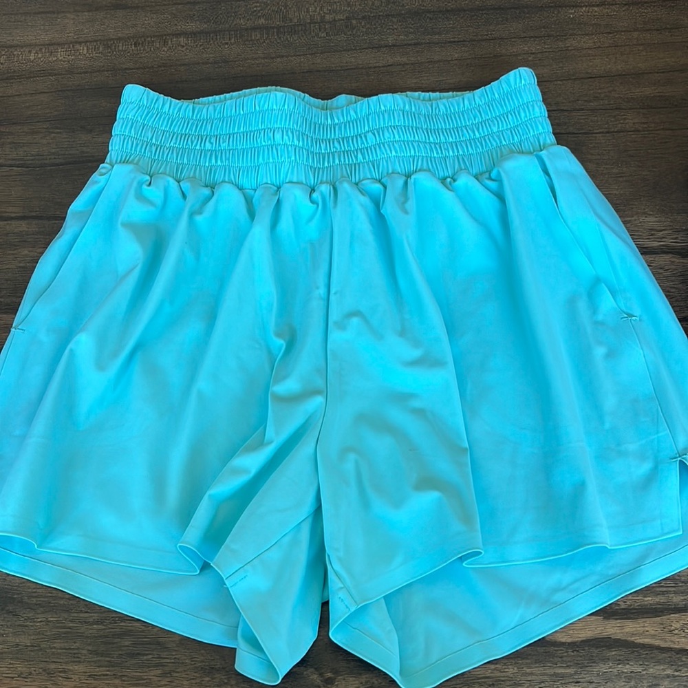 Lt Blue Elastic waste and ZYIA shorts, size s